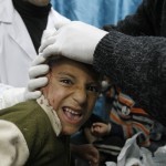 A wounded Palestinian child receives med