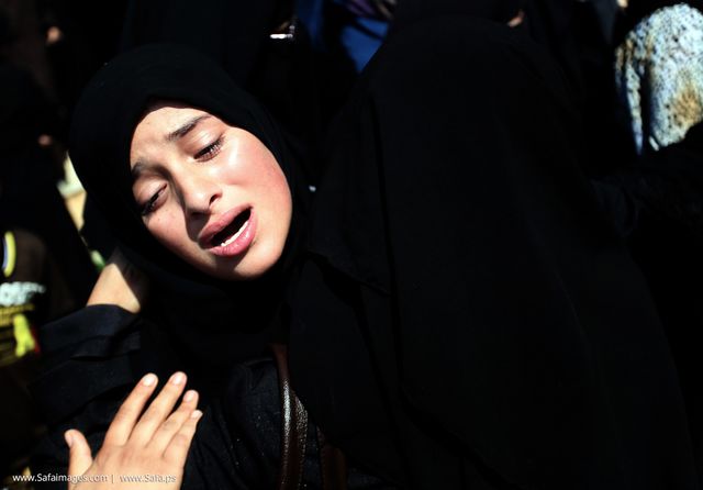A relative of Palestinian Hamas militant Abdulrahman al-Zameli mourns during his funeral in Rafah