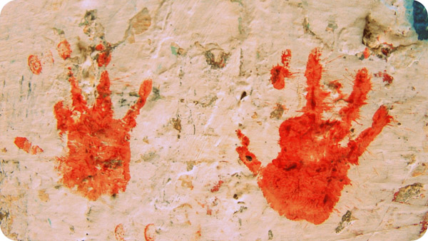 bloody hand print on the wall